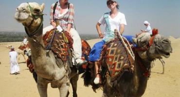 Students camel back riding in Egypt.